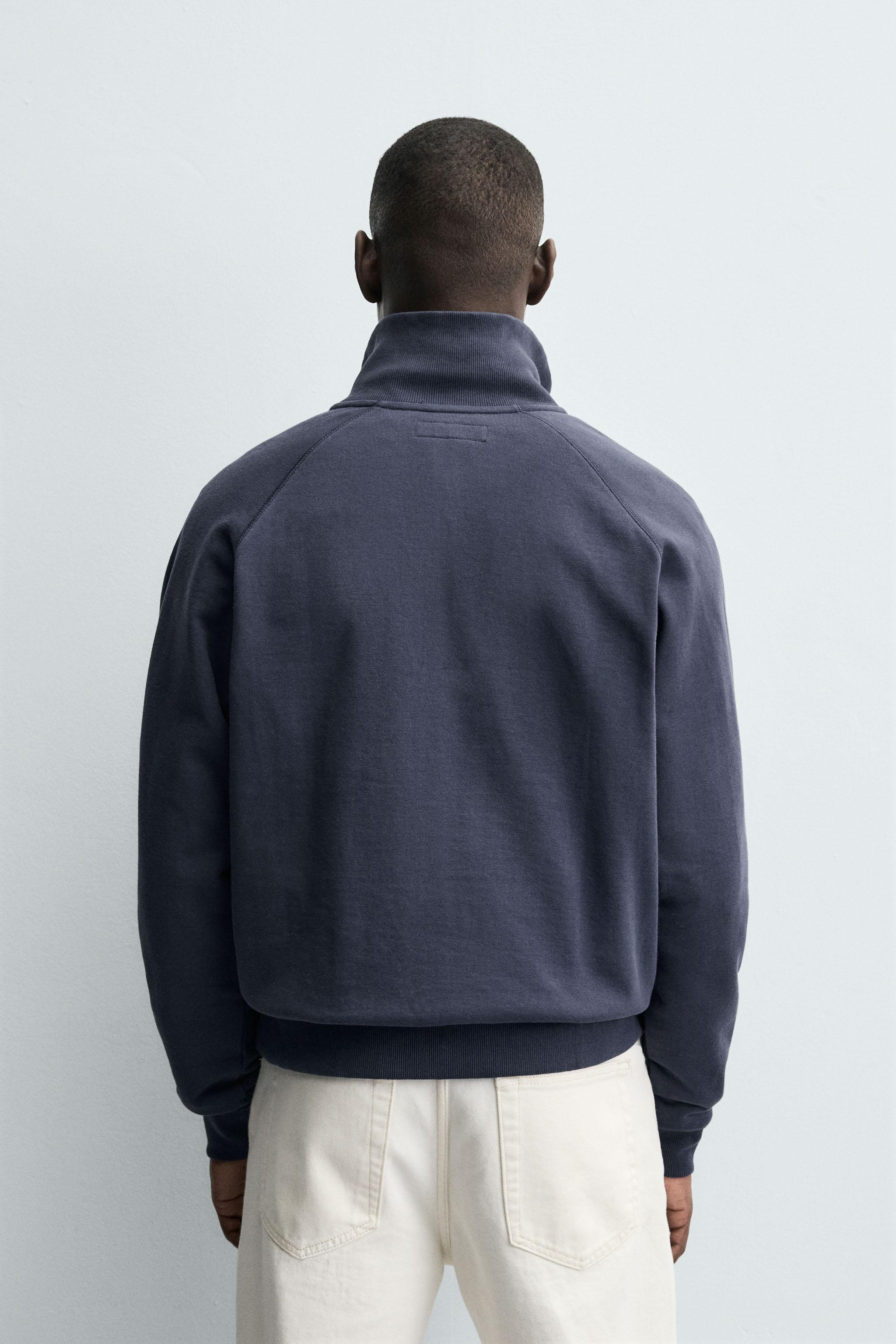 QUARTER-ZIP SWEATSHIRT